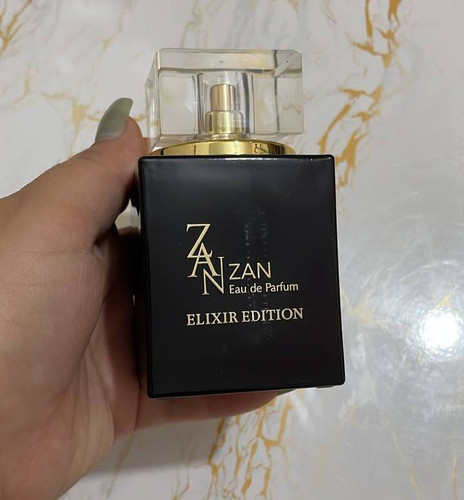 ادکلن عطر زنانه فراگرنس ورد مدل زان الکسیر ادیشن رایحه شیسیدو زن گلد الکسیر فروشگاه پرفیوم رایحه عطروادکلن