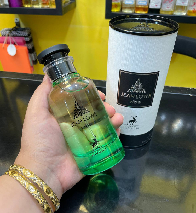 عطر ادکلن الحمبرا مدل جین لوو وایب رایحه لویی ویتون پسفیک چیل فروشگاه پرفیوم رایحه