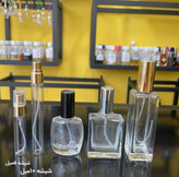 عطرادکلن سمبل عطراسانس عطر گرمی ۵ گرمی و۱۰ گرمی فروشگاه پرفیوم رایحه