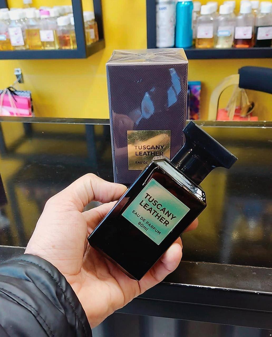 عطر ادکلن فراگرنس ورد رایحه تام فورد توسکان لدر حجم۸۰میل فروشگاه پرفیوم رایحه
