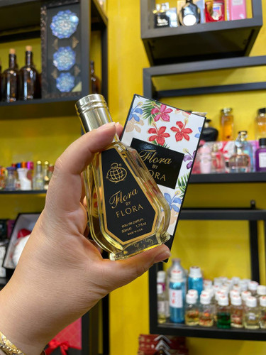 عطر ادکلن زنانه گوچی فلورا فراگرنس ورد فلورا بای فلورا (Fragrance World Gucci Flora by Gucci) حجم 50 میل فروشگاه پرفیوم رایحه